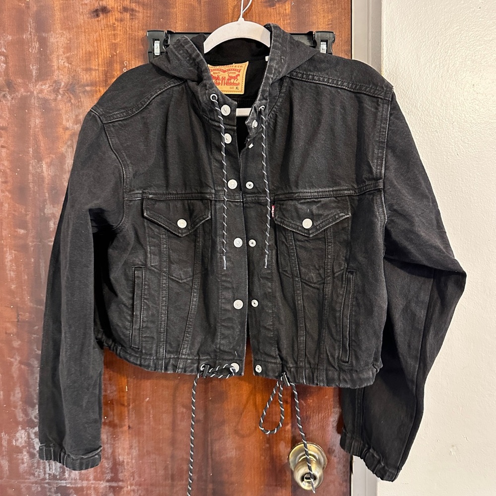 Cropped black jean jacket.